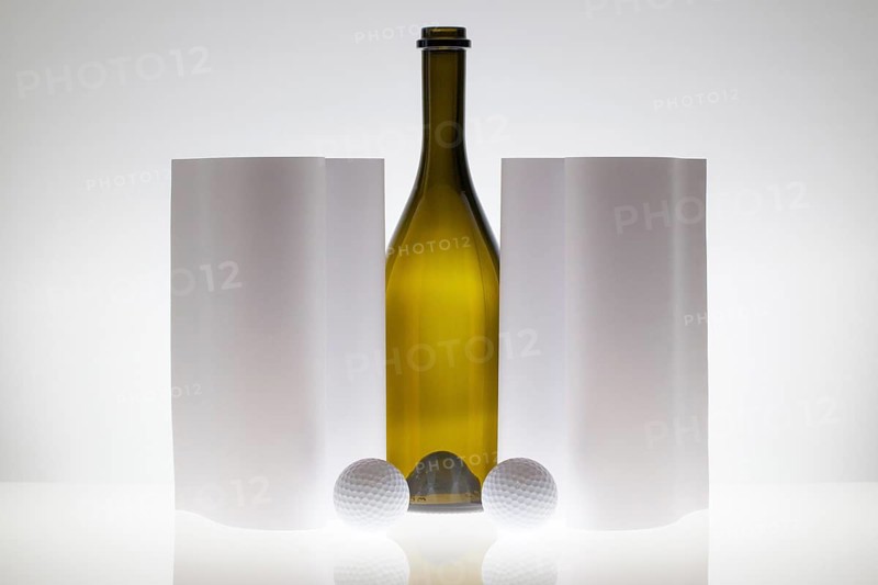 Symmetry abstract Paper Background with glass and golf balls on a glass table