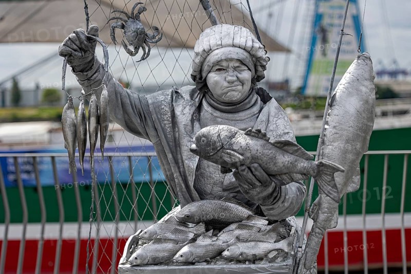 Detailed silver statue of a fisherwoman with fish, Hamburg harbour, Free and Hanseatic City of Hamburg, Germany, Europe