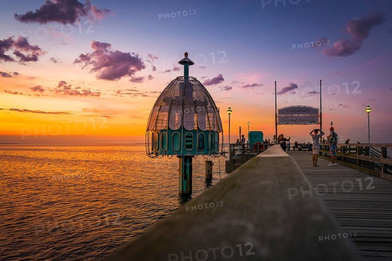 The Zinnowitz pier with diving bell in summer shortly after sunset