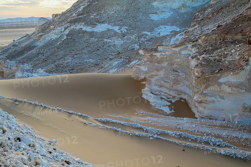 Late afternoon sun casting shadows on rocks in the Libyan desert white desert, Farafra, Egypt, Africa