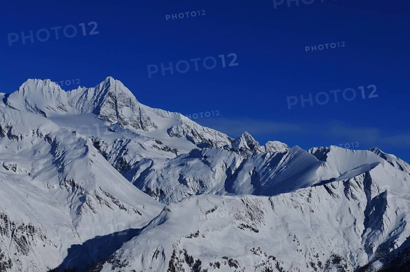 Panoramic mountain view of the Grossglockner Snow mountain range in East Tyrol from the Adler Lounge above Matrei