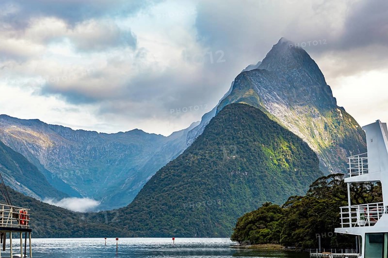 Port of tourist and pleasure boats of the Milford Sound fjord. The magical nature of the southern hemisphere. South Island, New Zealand. Fiordland park
