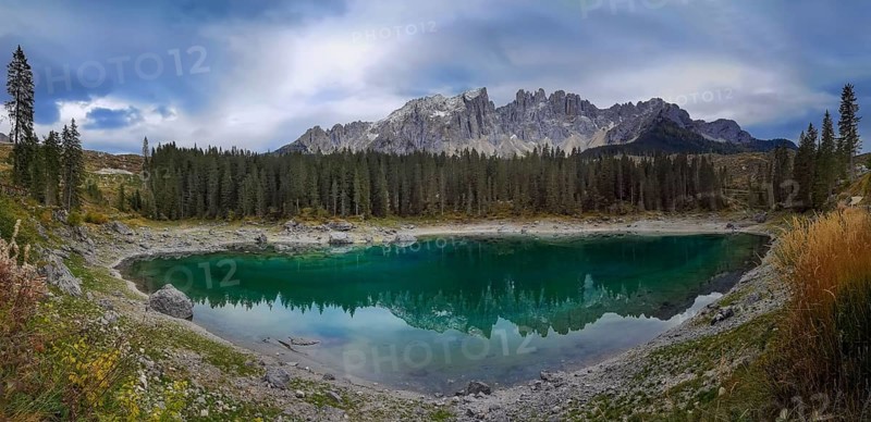 Karersee is located in the Latemarwald forest in the upper part of the Eggental valley, of the city of Bolzano at an altitude of 1520 meters above sea level of Nova Levante