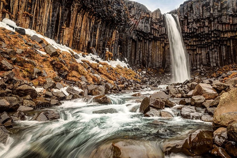 Svartifoss is one of the unique waterfalls in South-Iceland. It is situated in Skaftafell, which belongs to Vatnajokull National park. great black basalt wall behind the falls
