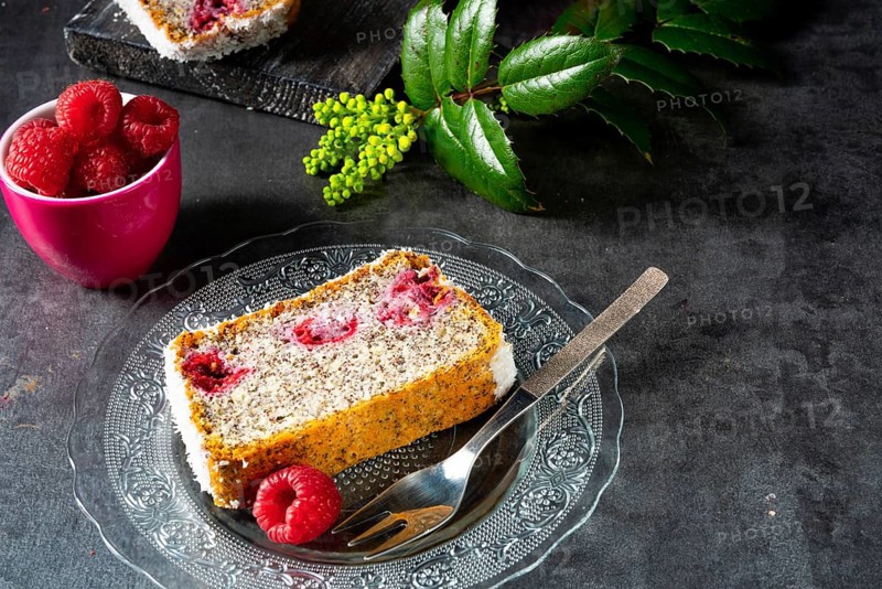 Poppy seed cake with raspberries and desiccated coconut