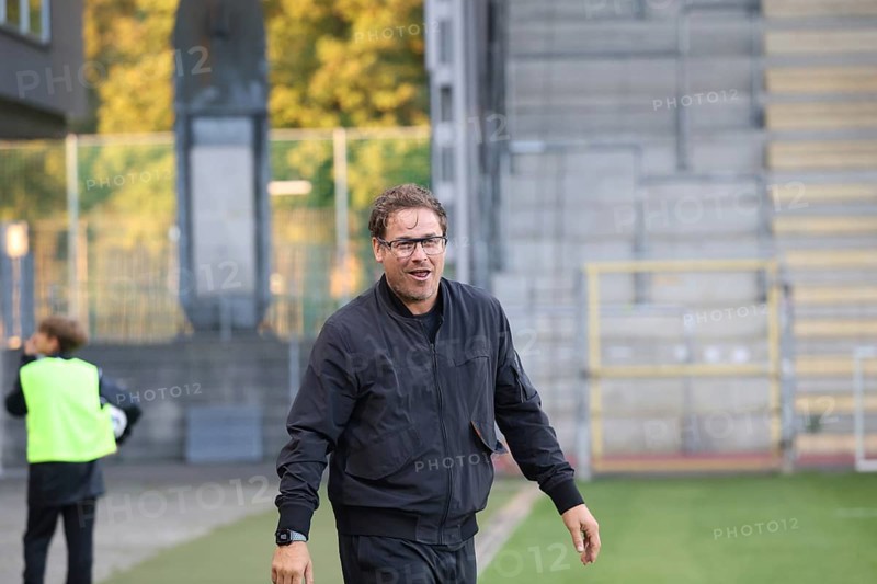 Coach Benedetto Muzzicato (SC Freiburg II / U23) had a good laugh during the match of the Soccer-RL SW 24-25: 9. Sptg: SC Freiburg II vs Bahlinger SC, Freiburg im Breisgau, Germany / Germany