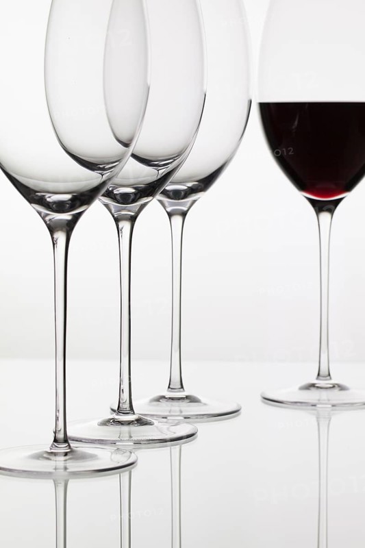 Four glasses of wine and on the white background