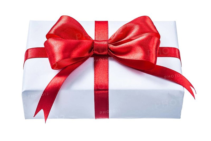 White present box with red ribbon isolated on white