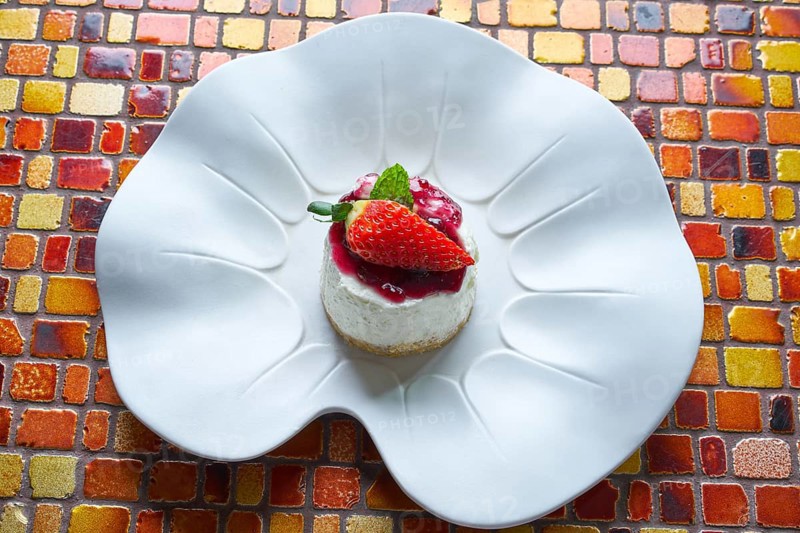 Cheesecake with cranberries sauce dessert