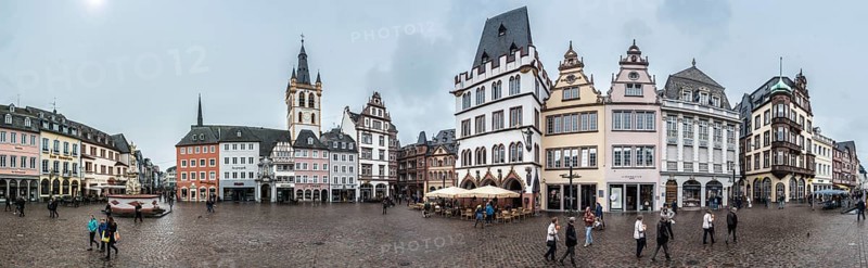 Trier, Rhineland-Palatinate, Germany, 04 15 2019, 180 degrees extra large panoramic view over the Hauptmark, the main market square in Trier with rainy weather, Europe