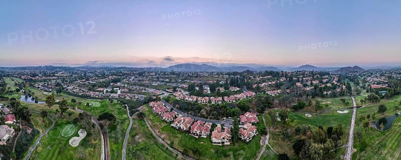 Aerial panoramic view of golf in upscale residential neighborhood during sunset, Rancho Bernardo, San Diego County, California. USA