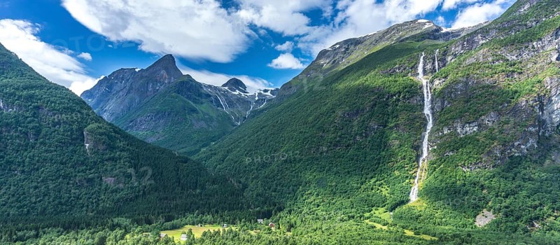 The Kjenndalsbreen is part of the Jostedalsbreen, one of the largest glaciers in Norway, and forms an impressive mountain landscape in Sande. The glacier Kjenndalsbreen in Norway is a beautiful place to travel to in summertime