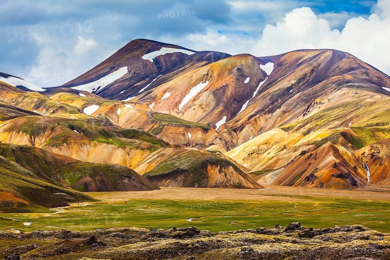 National Park Landmannalaugar. On the gentle slopes of the mountains are snow fields and glaciers. Magnificent Iceland in the July