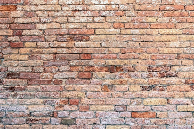Background of old vintage brick wall. Old brick wall texture background