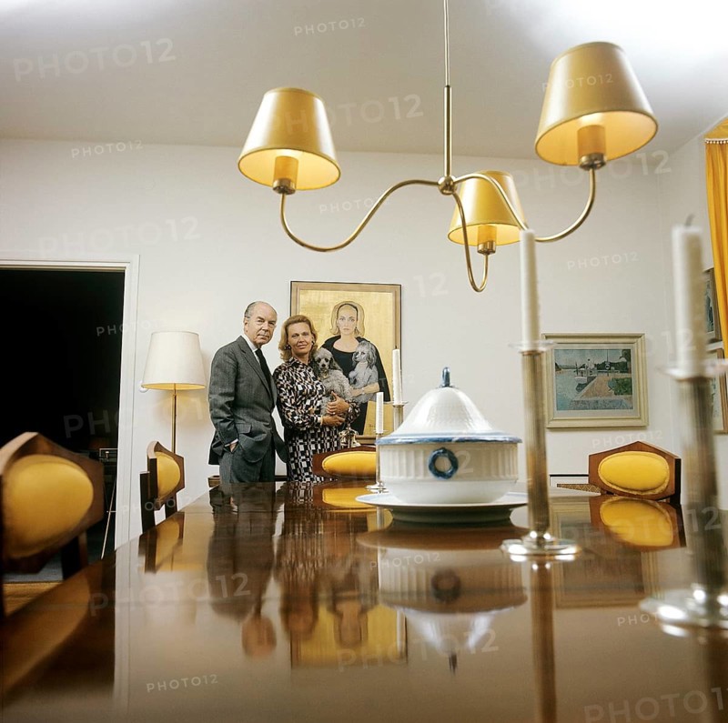 Gullan Marianne, Princess Bernadotte, Countess of Wisborg (née Lindberg, later Tchang, born 15 July 1924), also known as Princess Marianne Bernadotte, is a Swedish actress, fashion icon and philanthropist who in 1961 married Sigvard Bernadotte, the second son of Gustaf VI Adolf of Sweden. Pictured: Marianne and Sigvard Berndotte 1974 where they stand in the large dining room. On the wall behind the Countess hangs the artist Zoia's painting of her. Kristoffersson