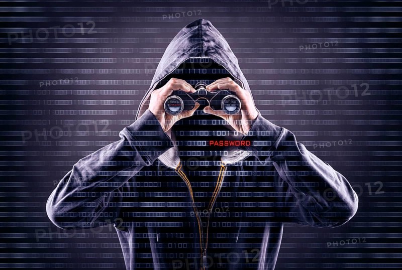 faceless person is looking for a password