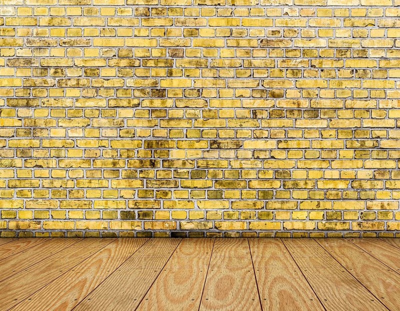 Room interior vintage with yellow brick wall and wood floor background