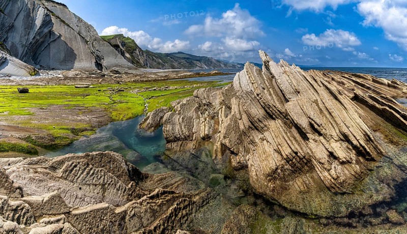 A view of the Flysch rock formations and cliffs with tidal pools on the Basque Country coast near Zumaia