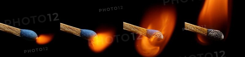 Igniting Match against Black background
