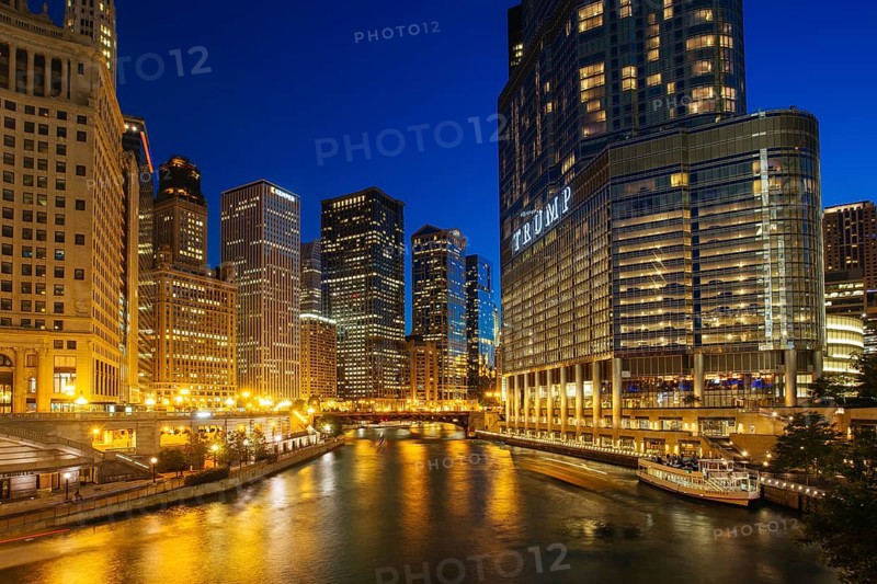 Chicago, USA, August 13th 2015: The night time view of Chicago River and surrounding buildings from the Wrigley Building and N Michigan Avenue, North America