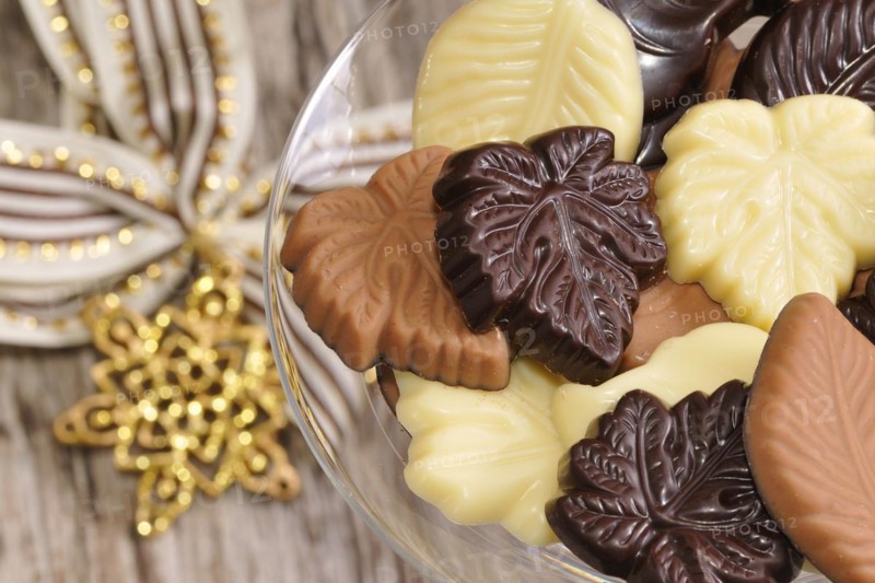 Chocolate leaves with decoration. Different types of chocolate