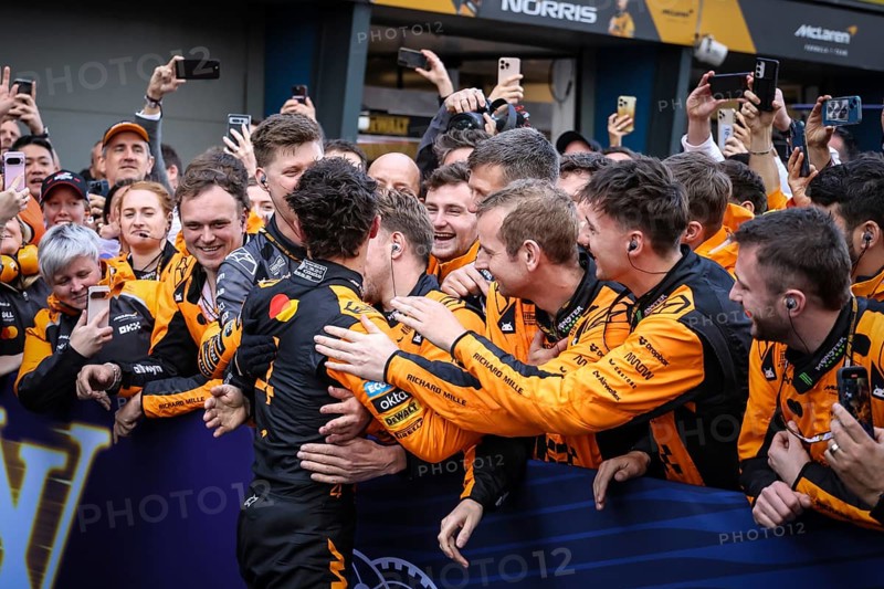 Lando Norris of Great Britain and McLaren Formula 1 Team celebrates winning the Australian Formula 1 Grand Prix with his team at Albert Park in Melbourne, Australia, Oceania