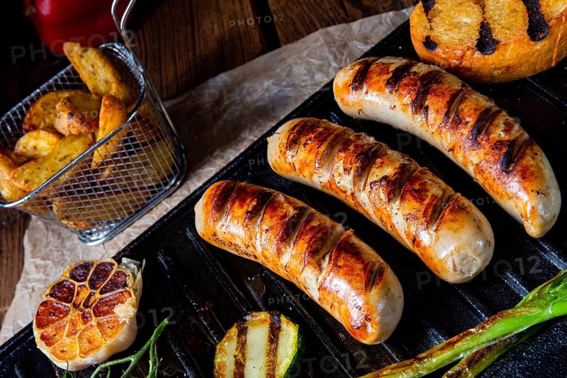 Delicious grilled sausage with various grilled vegetables