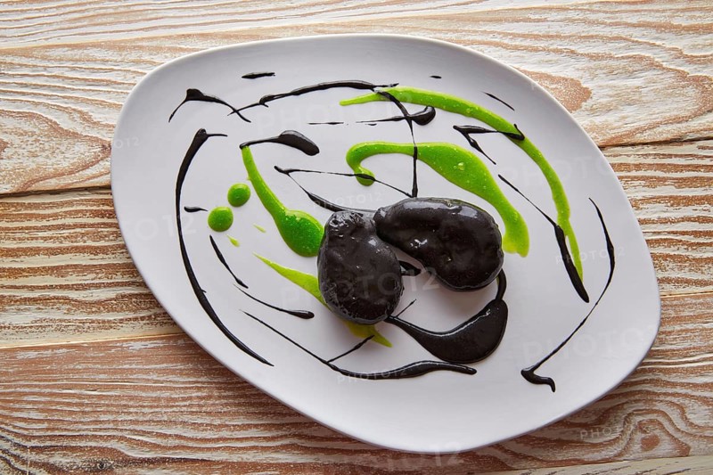 Molecular gastonomy cuttlefish roes with citrus mayonnaise