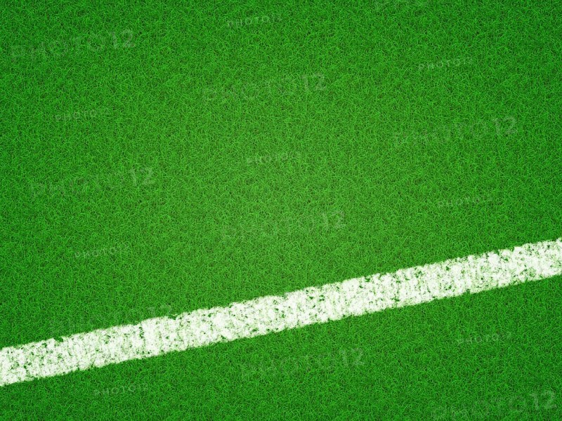 An image of a green grass soccer background