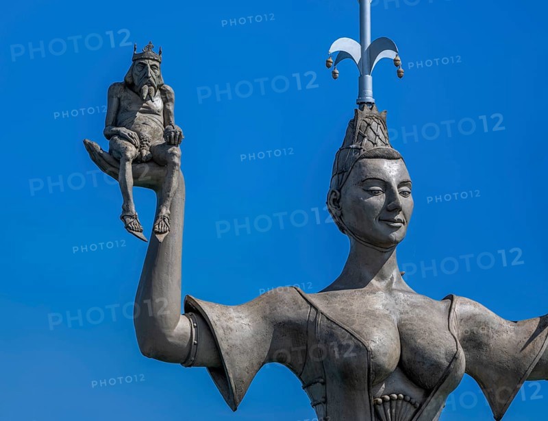 Royal figure on the right hand of Imperia, a rotating, nine-metre-high concrete statue in the port of Constance, designed by Peter Link. The statue is a satirical reminder of the Council of Constance (1414-1418), Constance, Baden-Württemberg, Germany, Europe