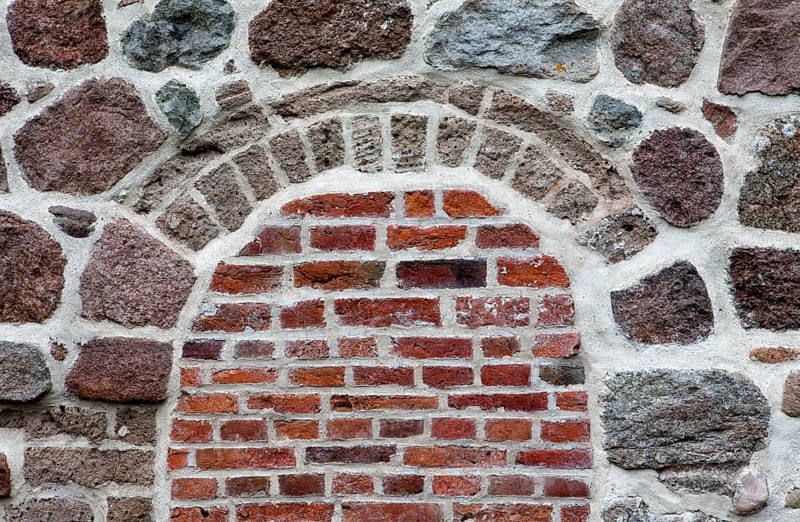 Old stone wall made of erratics rocks and bricks, Church of St. Urbanus, Dorum, Lower Saxony, Germany, Europe, Steinmauer aus Feldsteinen und Ziegelsteinen, Kirche St. Urbanus, Dorum, Niedersachsen, Deutschland, Europa, Europe