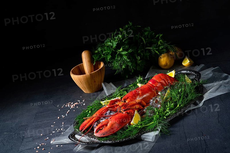 The cooked lobster on ice