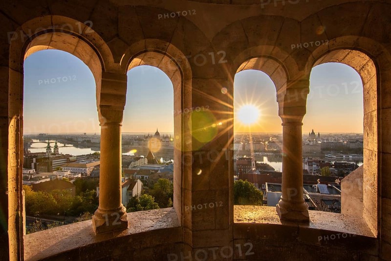 Old historic fortress and church at sunrise. City panorama at dusk. View of the Danube Fishermen's Bastion, Halászbástya, Budapest, Hungary, Europe