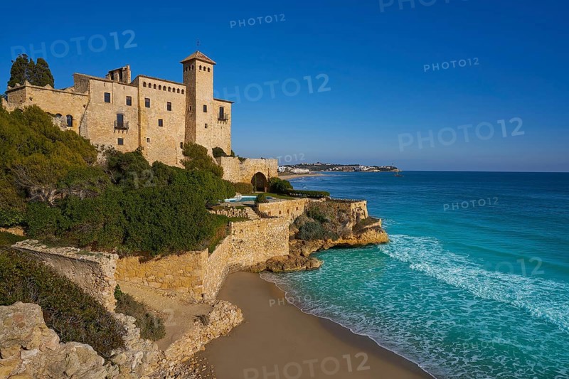 Cala La Jovera beach under Tamarit castle in Tarragona of Catalonia