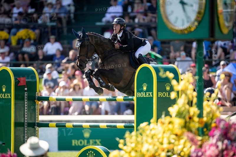 Michael Pender of Ireland and riding HHS Calais compete in the first round of the 1.60m CPKC International during the Spruce Meadows Masters, presented by Rolex, in Calgary, Alberta, Canada, North America