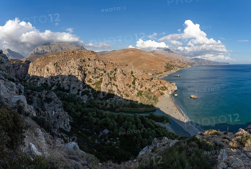A picture of the Preveli Beach and the Preveli Palm Forest, as well as the nearby landscape and coast