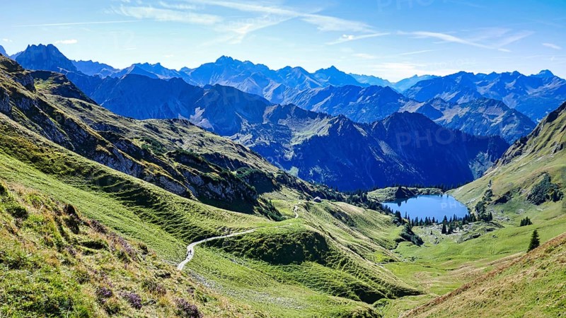 Oberstdorf, panoramic view over the mountains in glorious summer weather, bright blue sky
