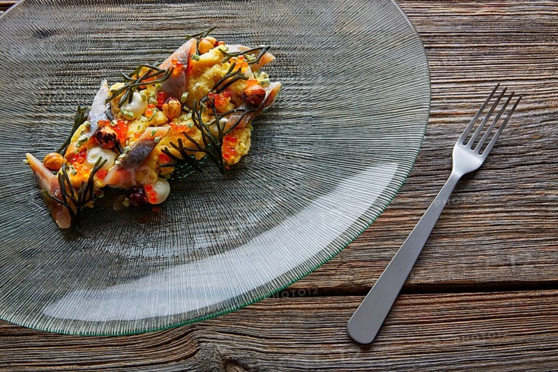 Smoked sardines salad with creamy cheese corn codium and hazelnuts