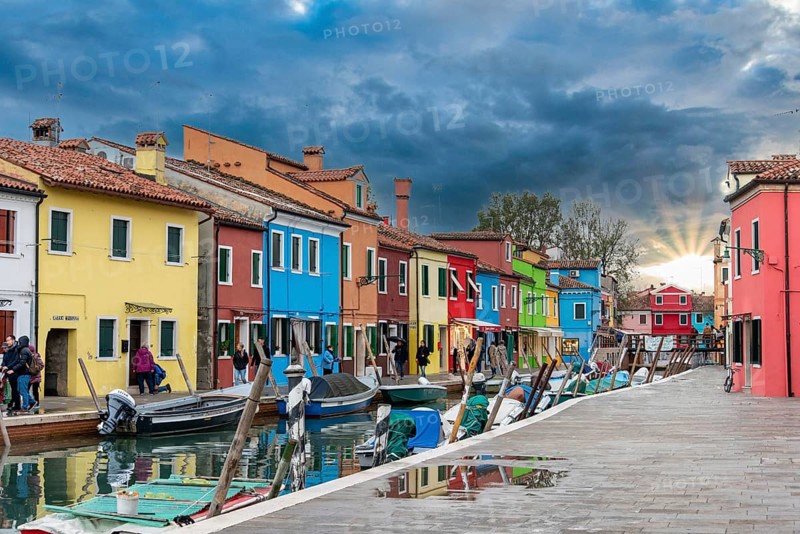 Colorful Houses in Burano beneath a scenic sky, Island of Venice, Italy, Europe