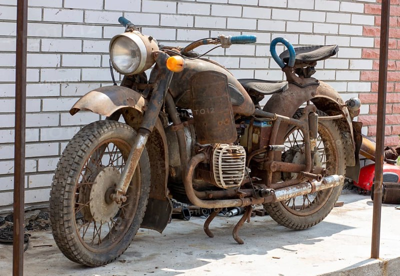 Old rusty retro motorcycle. Bike for restoration