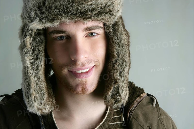 Fur winter fashion hat young man brown autumn color