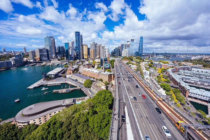 SYDNEY, AUSTRALIA, MARCH 4 2023: The Sydney CBD and surrounding harbour, including Circular Quay and The Rocks on a clear autumn day in Sydney, Australia, Oceania