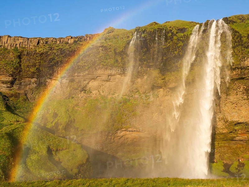 Rainbow at Seljalandsfoss waterfall, South Iceland, Iceland, Europe