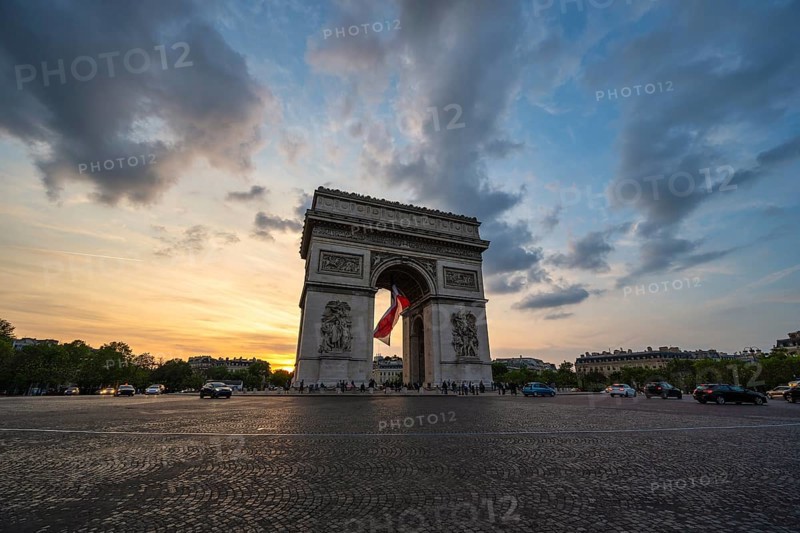 Paris France, city skyline sunset at Arc de Triomphe and Champs Elysees