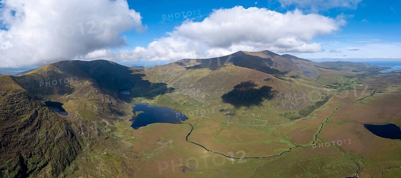 A panorama aerial view of the Mountains of the Central Dingle Peninsula and Connor Pass in County Kerry of Ireland