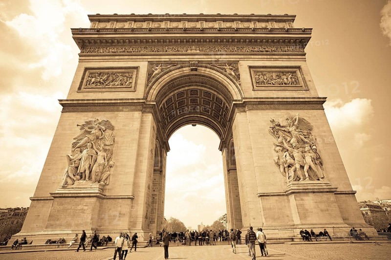The Arc-de-Triomphe in Paris, France. Toned on sepia (old photograph) . Austria