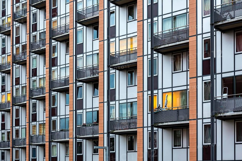 Leuven, Flemish Brabant Region, Belgium, 01 29 2022: Detail of windows and balconies at a social housing skyscraper, Europe