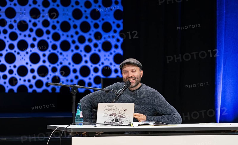 FRANKFURT AM MAIN, Germany, October 22 2023: Marc-Uwe Kling (*1982, German songwriter, author, and cabaret artist) reads at the 75th Frankfurt Book Fair, Europe