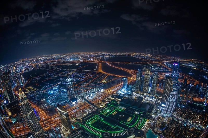 Dubai night view seen from the observation deck of Burj Khalifa. Shooting Location: Dubai