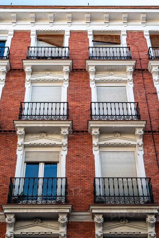 Old residential building in central Madrid. Real estate, renovation and maintenance concepts